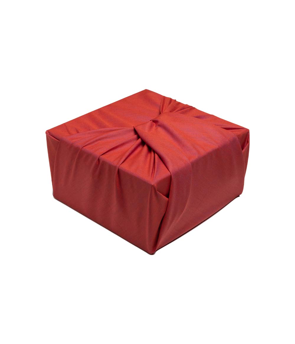 Deep Coral fabric gift wrapped box at an angle