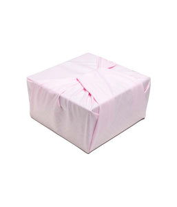 Baby Pink fabric gift wrapped box at an angle