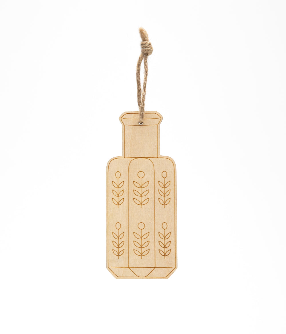 Tol’lah traditional Arabian perfume bottle wooden decorative token